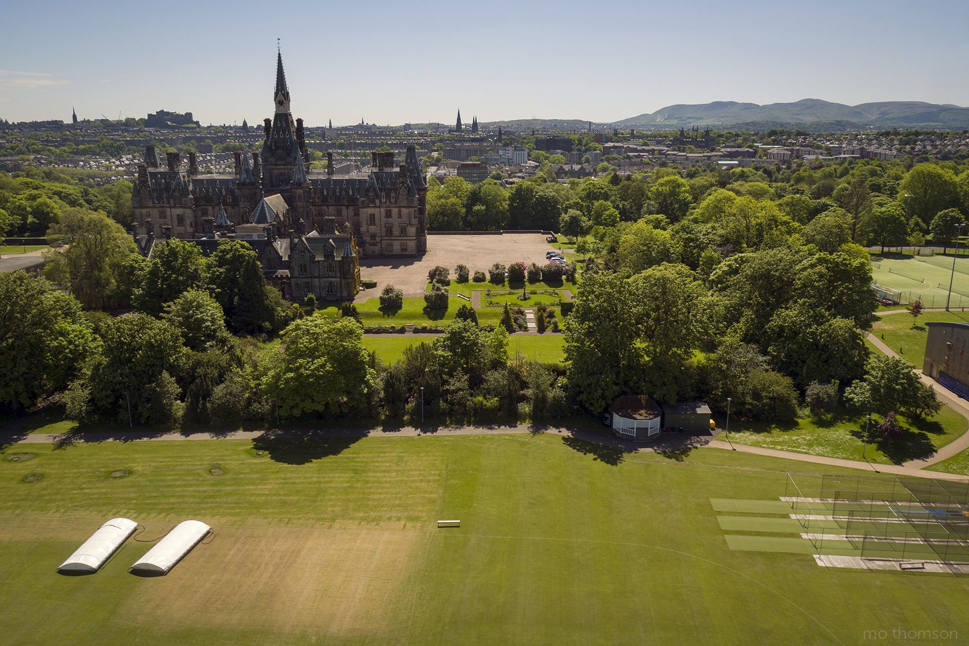 Aerial image showing the back of the main building with the Heads lawn and some of Bigside pitch at the front