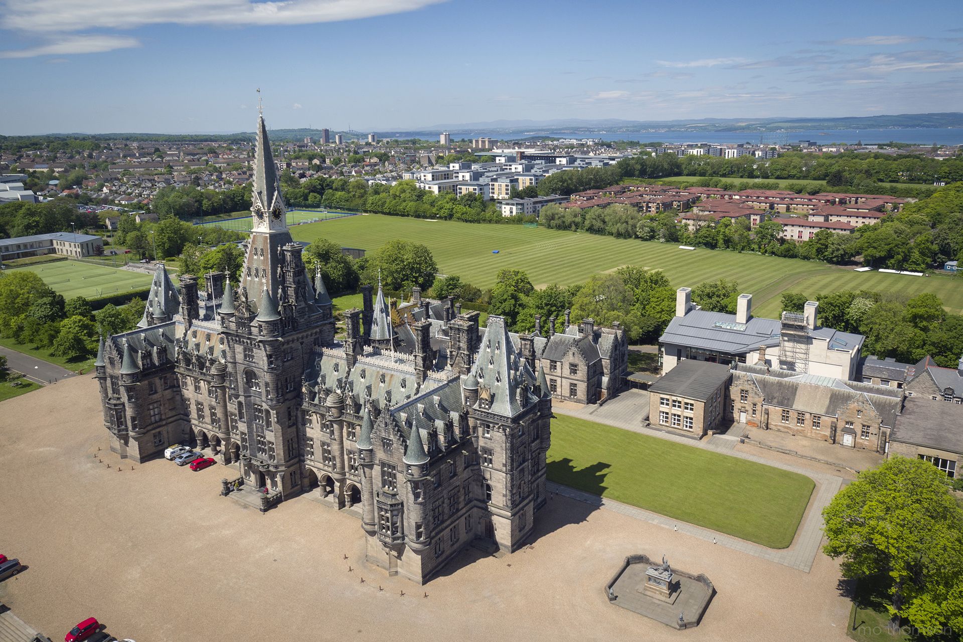 Aerial image showing the front of the main building and the War Memorial from the East side
