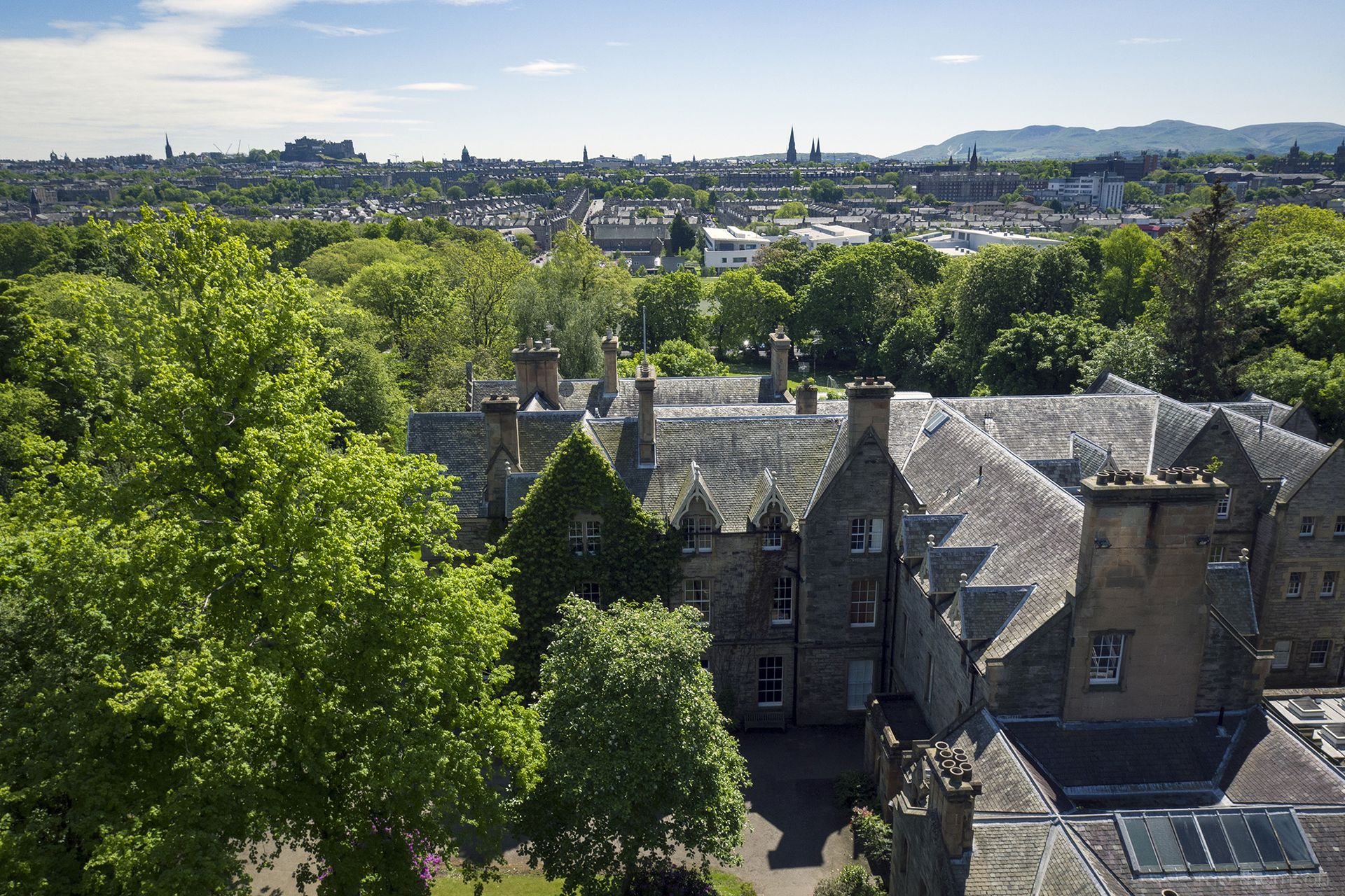 Aerial image showing the top of Carrington House and the skyline of Edinburgh